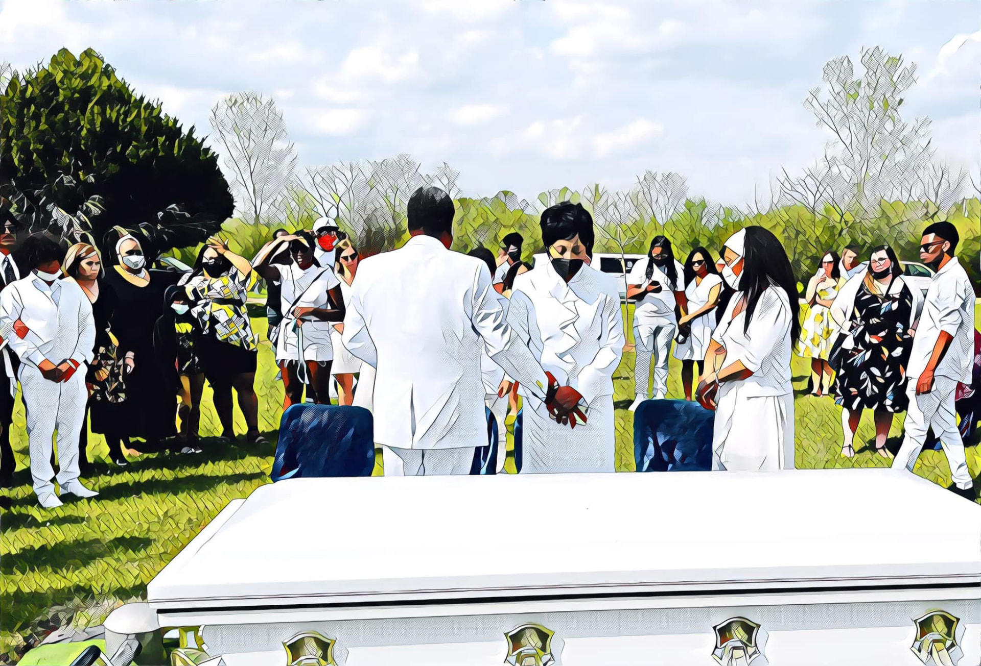Family dressed in white gathered around Jerome's white casket at the graveside
